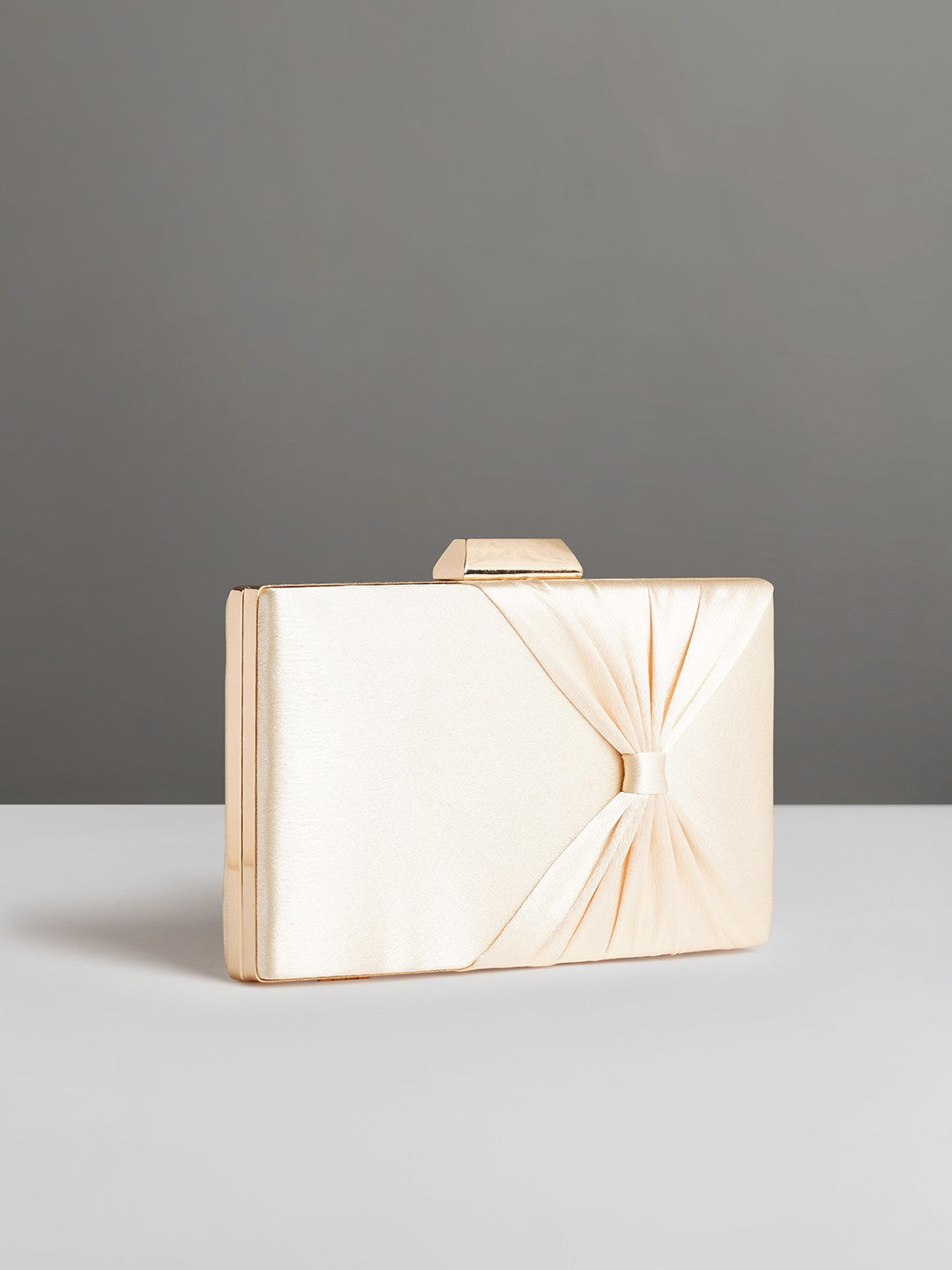 Lavie Women Shiny Gold-Toned Bow Detail Frame Clutch